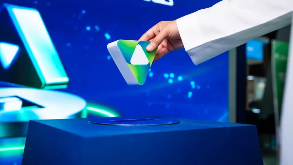 Close-up of a Tarshid-branded card placed on the interactive pedestal